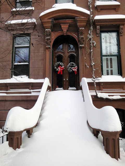 brownstone covered in snow in NYC