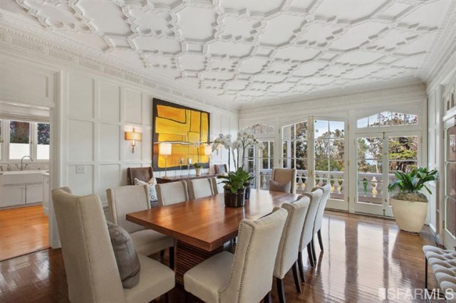 Check out the ceiling detail and tapered french doors in this masterpiece of a dining space. This is only one work of art in this masterpiece of a home located in San Francisco, currently listed by Malin Giddings with Coldwell Banker Residential Brokerage.
