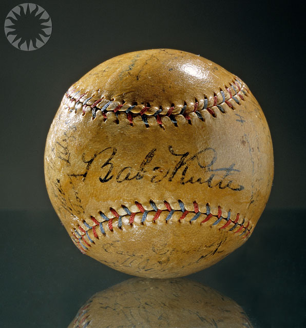 SI Neg. 2004-11263. Date: 2004. Signed by Ruth and 26 other Yankees, this ball was a get-well gift for Elliot Spencer, a young neighbor of the Yankees' manager. Before Ruth and cork-centered balls, home runs were rare. Ruth regularly drove the ball into the stands or out of the park. Fans lined up for autographs, which he gladly provided. Credit: Eric Long (Smithsonian Institution)