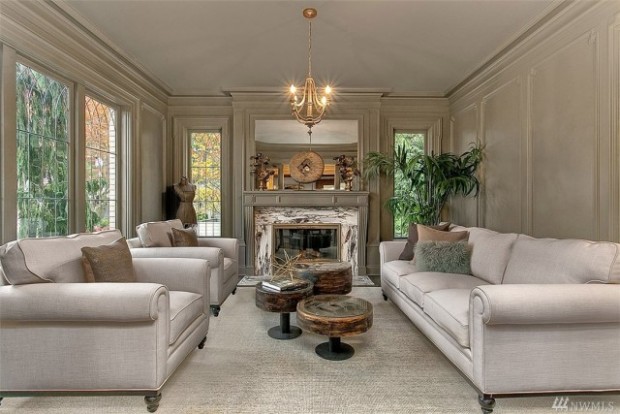 Winter white has a new meaning in this inviting space. We love the marble fireplace and 