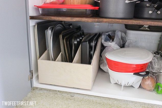 Store baking sheets and tins in a pull-out cabinet