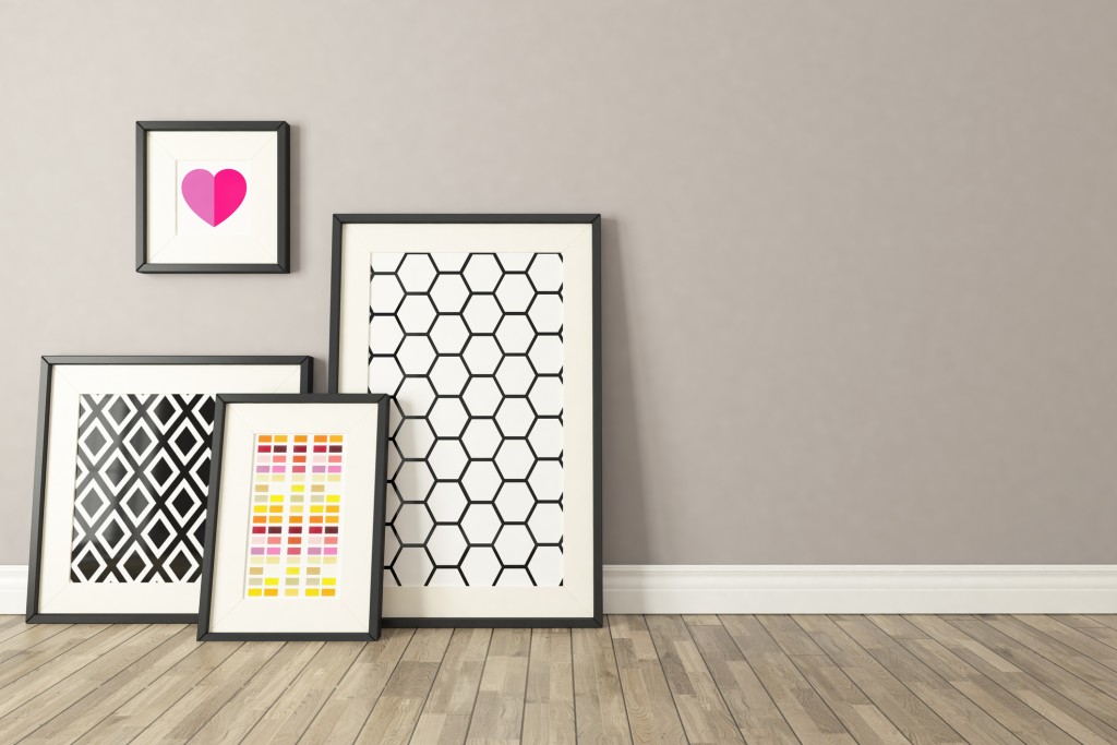Blank picture frames with wall and wooden parquet decor, background, template design