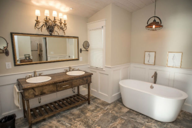 Located on the Intracoastal in St. Augustine, FL this home's master bath has a custom vanity with his and hers sinks, freestanding oval bathtub and a walk-in shower with dual shower heads. There's even an electric towel warmer just in case it gets too chilly in that Florida A/C. Ready to spend the afternoon in this soak tub? It's located at 2741 Harbor Court, Saint Augustine, FL and is listed for $1,399,000 by Jane Wolfe with Coldwell Banker Premier Properties.