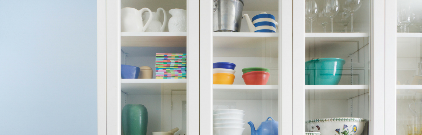 The Trick To Organizing A Kitchen With Glass Front Cabinets