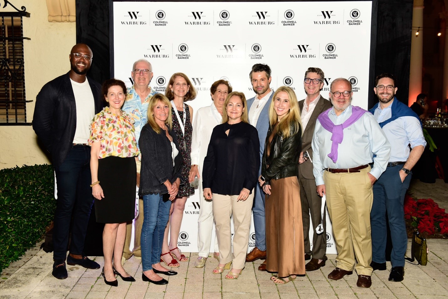 The Jills Zeder Group Gathers Warburg Realty and Elite Coldwell Banker